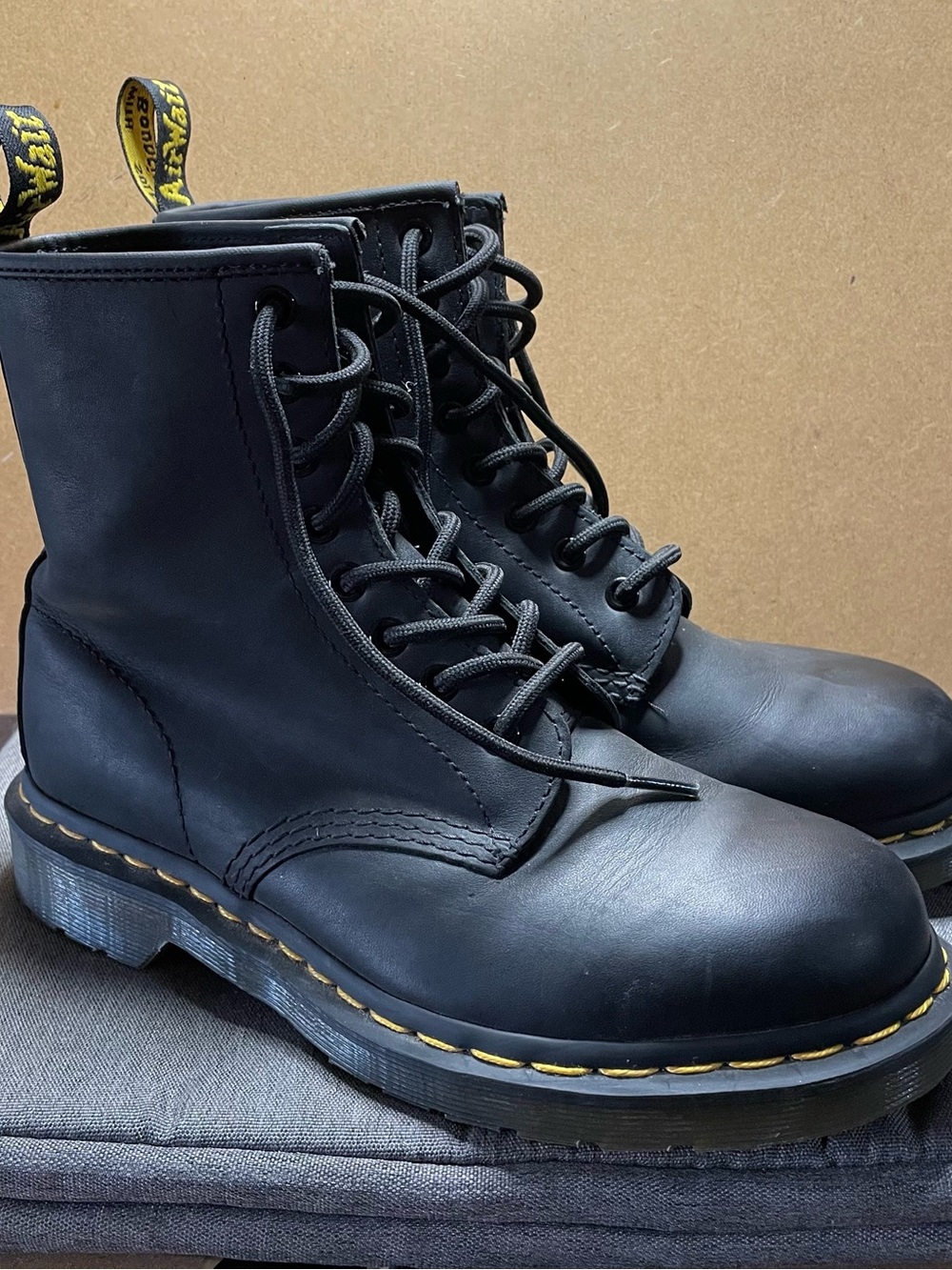 Dr. Martens Black Leather 8‑Eye Lace-Up Boots with Yellow Stitching